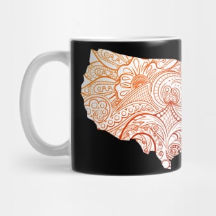 Colorful mandala art map of the United States of America in brown and orange on white background Mug